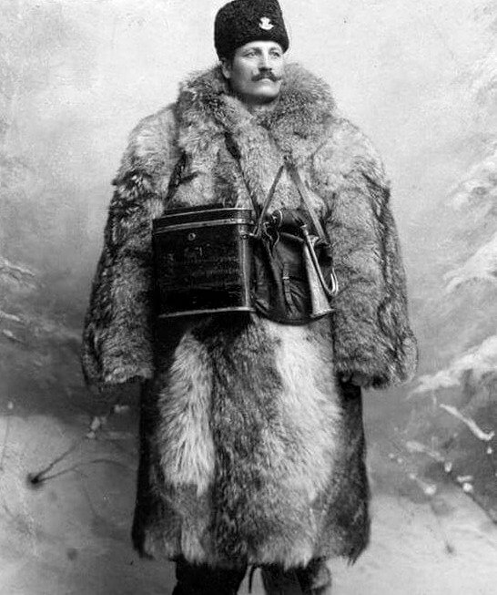 A Rural Mail Carrier Dressed in Uniform Ready for a Harsh Winter