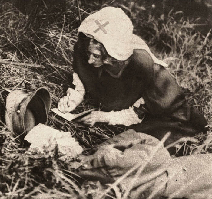 This WWI Nurse Is Writing Down This Man's Last Words on the Battlefield
